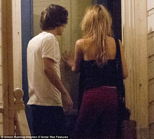 Going inside: Harry walked Emma to her door after their night out enjoying themselves  